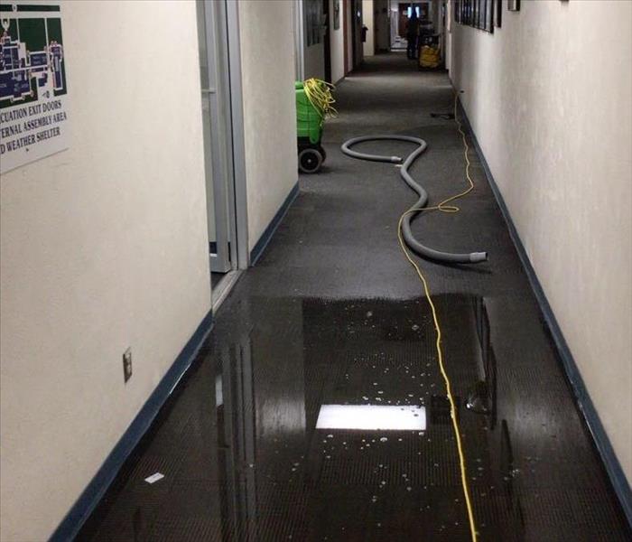 Flooded Dallas Office Hallway